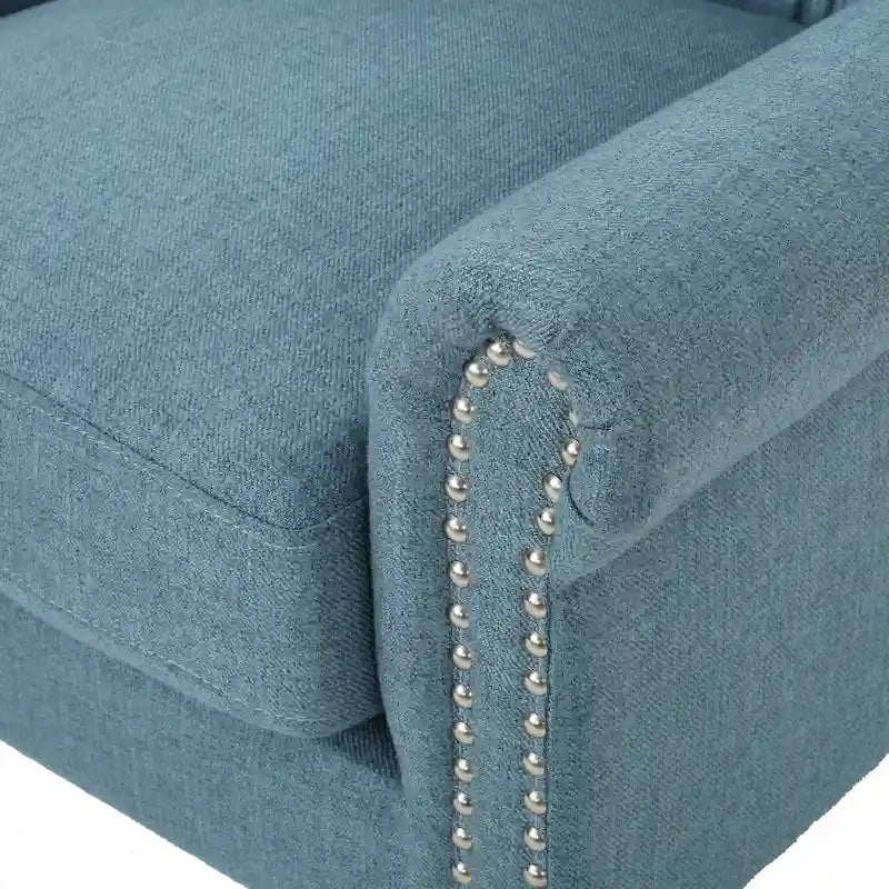 Fauteuil d'appoint moderne bleu à dossier haut capitonné avec clous décoratifs pour salon