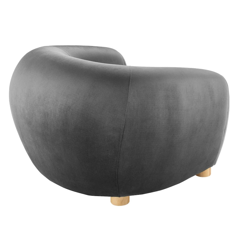 Fauteuil d'appoint en velours haute performance avec lignes organiques et passepoil français