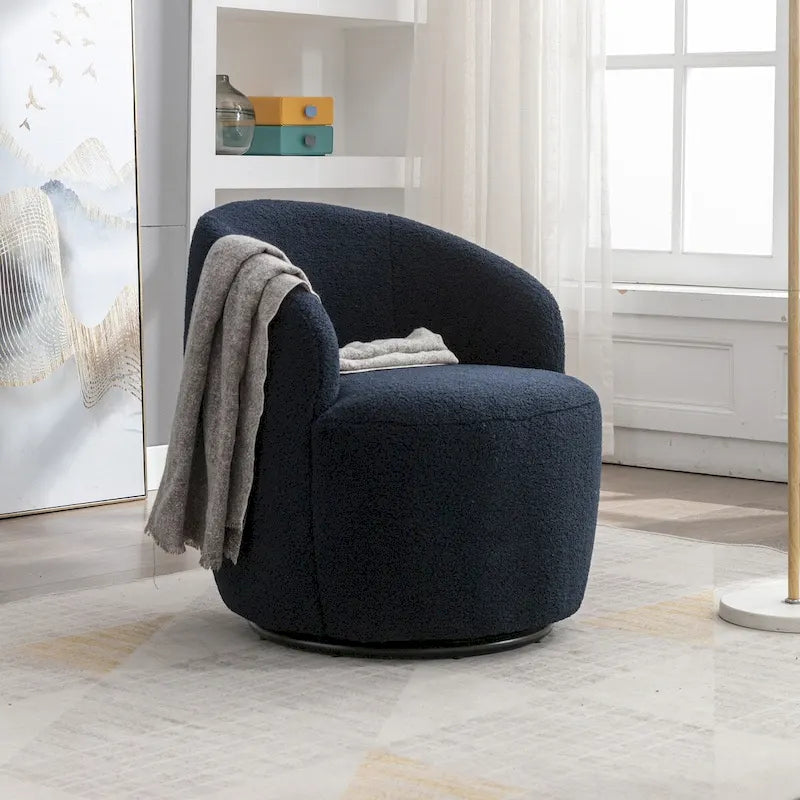 Fauteuil pivotant en velours avec piètement en métal laqué noir.