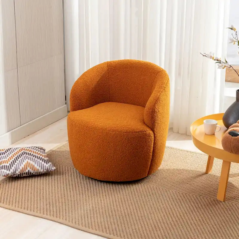 Fauteuil pivotant en velours avec piètement en métal laqué noir.