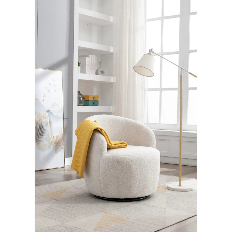 Fauteuil pivotant en velours avec piètement en métal laqué noir.