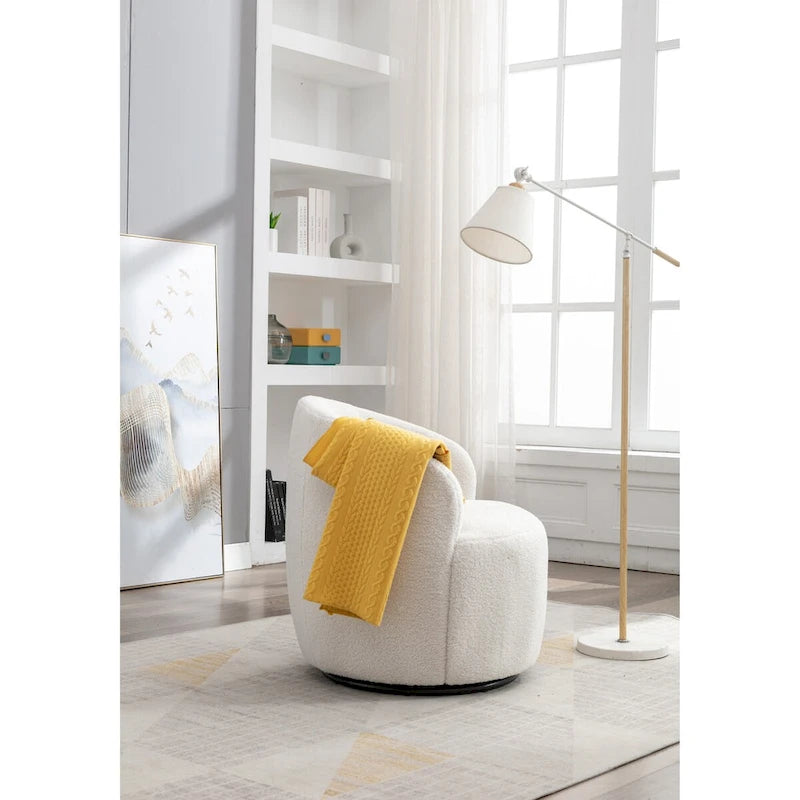 Fauteuil pivotant en velours avec piètement en métal laqué noir.