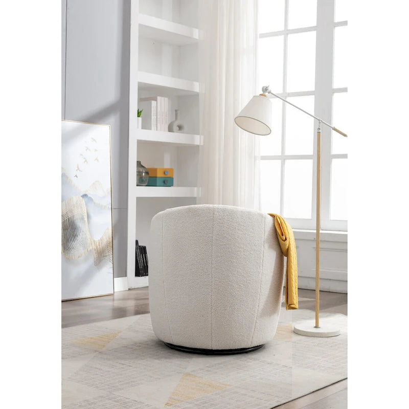 Fauteuil pivotant en velours avec piètement en métal laqué noir.